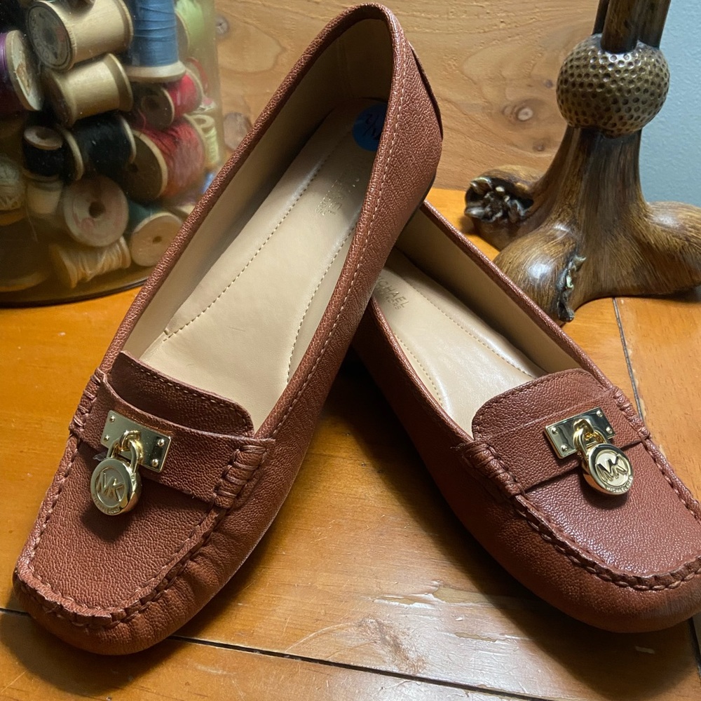 Michael Kors flat dress shoes, women’s size 7.5 with gold hardware.